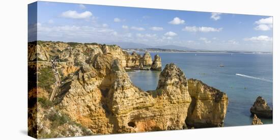 The cliffs and sea stacks of Ponta da Piedade, Algarve, Portugal.-Martin Zwick-Stretched Canvas