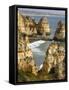 The cliffs and sea stacks of Ponta da Piedade, Algarve, Portugal.-Martin Zwick-Framed Stretched Canvas