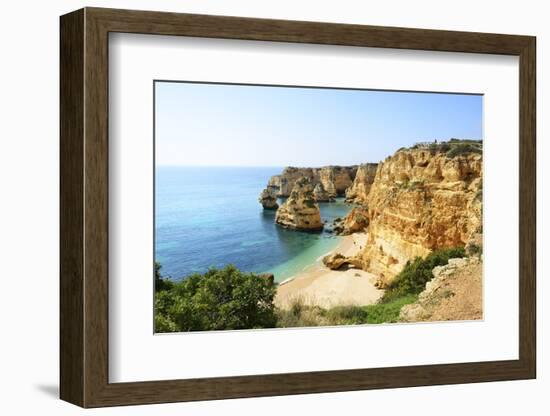 The coastal rock formations at Marinha beach (Praia da Marinha). Algarve, Portugal-Mauricio Abreu-Framed Photographic Print