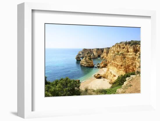 The coastal rock formations at Marinha beach (Praia da Marinha). Algarve, Portugal-Mauricio Abreu-Framed Photographic Print