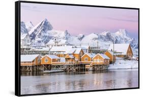 The Colors of Dawn Frame the Fishermen's Houses Surrounded by Frozen Sea, Sakrisoy, Reine-Roberto Moiola-Framed Stretched Canvas