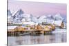 The Colors of Dawn Frame the Fishermen's Houses Surrounded by Frozen Sea, Sakrisoy, Reine-Roberto Moiola-Stretched Canvas