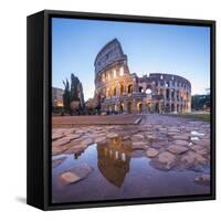 The Colosseum (Flavian Amphitheatre), UNESCO World Heritage Site, reflected in a puddle at dusk, Ro-Roberto Moiola-Framed Stretched Canvas