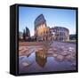 The Colosseum (Flavian Amphitheatre), UNESCO World Heritage Site, reflected in a puddle at dusk, Ro-Roberto Moiola-Framed Stretched Canvas