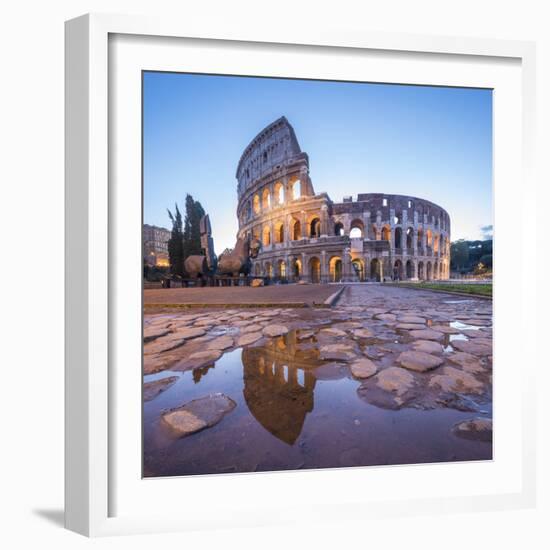 The Colosseum (Flavian Amphitheatre), UNESCO World Heritage Site, reflected in a puddle at dusk, Ro-Roberto Moiola-Framed Photographic Print