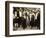 THE COUNT, foreground left: Charlie Chaplin, foreground second from right: Edna Purviance, 1916.-null-Framed Art Print