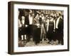 THE COUNT, foreground left: Charlie Chaplin, foreground second from right: Edna Purviance, 1916.-null-Framed Art Print