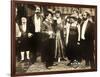 THE COUNT, foreground left: Charlie Chaplin, foreground second from right: Edna Purviance, 1916.-null-Framed Art Print