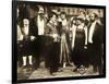 THE COUNT, foreground left: Charlie Chaplin, foreground second from right: Edna Purviance, 1916.-null-Framed Art Print