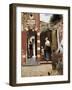 The Courtyard of a House in Delft-Pieter Cornelisz Hoock-Framed Art Print