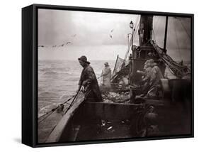 The Crew of a Yarmouth Herring Boat Pull in Their Catch on a Storm Tossed North Sea, 1935-null-Framed Stretched Canvas