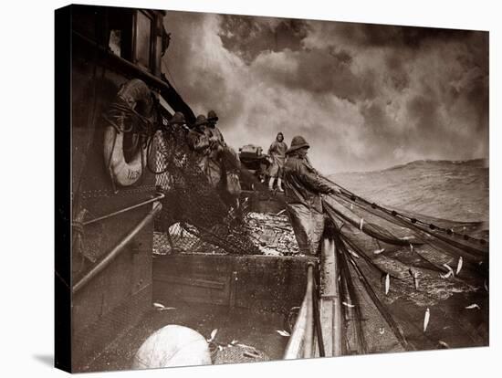 The Crew of a Yarmouth Herring Boat Pull in Their Catch on a Storm Tossed North Sea, 1935-null-Stretched Canvas