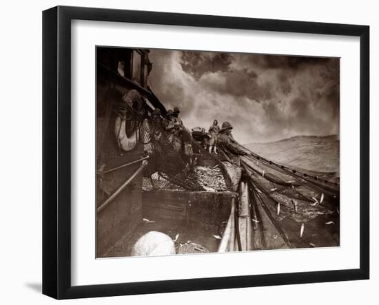 The Crew of a Yarmouth Herring Boat Pull in Their Catch on a Storm Tossed North Sea, 1935-null-Framed Premium Photographic Print