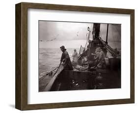 The Crew of a Yarmouth Herring Boat Pull in Their Catch on a Storm Tossed North Sea, 1935-null-Framed Photographic Print