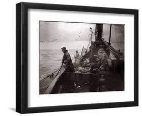 The Crew of a Yarmouth Herring Boat Pull in Their Catch on a Storm Tossed North Sea, 1935-null-Framed Photographic Print