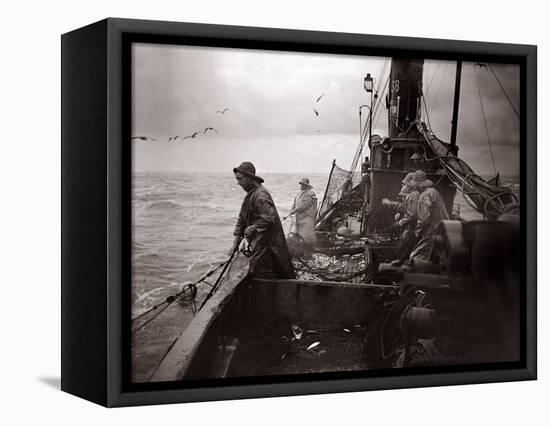 The Crew of a Yarmouth Herring Boat Pull in Their Catch on a Storm Tossed North Sea, 1935-null-Framed Stretched Canvas