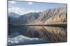 The crystal clear Shyok River creates a mirror image in the Khapalu valley near Skardu, Pakistan-Alex Treadway-Mounted Photographic Print