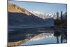 The crystal clear Shyok River creates a mirror image in the Khapalu valley near Skardu, Pakistan-Alex Treadway-Mounted Photographic Print