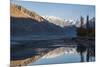 The crystal clear Shyok River creates a mirror image in the Khapalu valley near Skardu, Pakistan-Alex Treadway-Mounted Photographic Print