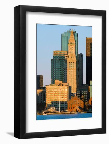 The Customs House Clock Tower and Boston skyline at sunrise, as seen from South Boston, Massachu...-null-Framed Photographic Print