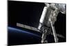 The Cygnus Spacecraft Attached to the Harmony Node in the Grasp of Canadarm2-null-Mounted Photographic Print