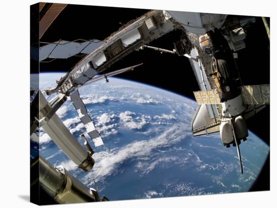 The Docked Space Shuttle Atlantis (STS-115) and a Soyuz Spacecraft-Stocktrek Images-Stretched Canvas