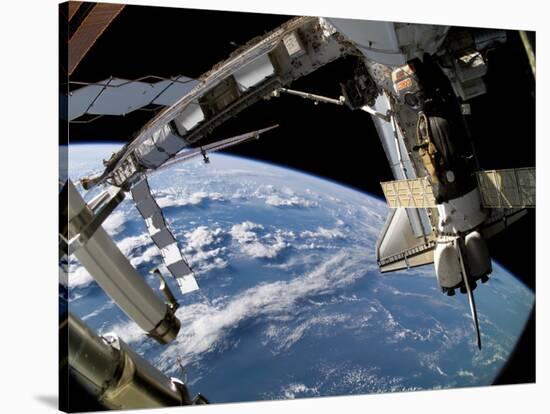 The Docked Space Shuttle Atlantis (STS-115) and a Soyuz Spacecraft-Stocktrek Images-Stretched Canvas