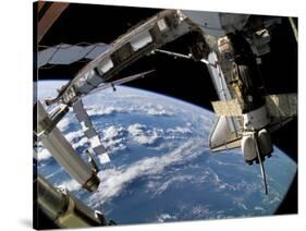 The Docked Space Shuttle Atlantis (STS-115) and a Soyuz Spacecraft-Stocktrek Images-Stretched Canvas