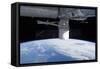 The Docking of Spacex Dragon to the International Space Station Above Earth-null-Framed Stretched Canvas