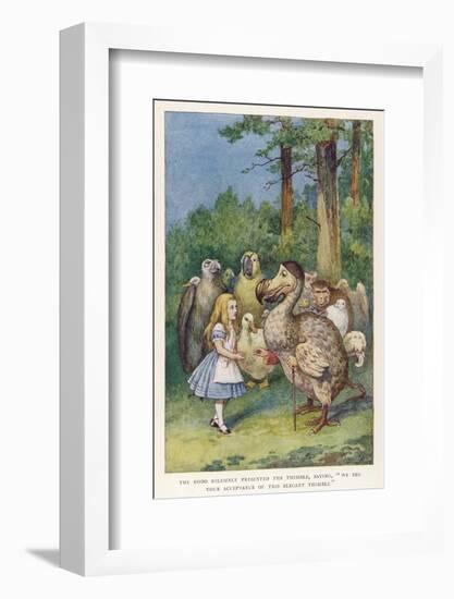 The Dodo Solemnly Presented the Thimble Saying "We Beg Your Acceptance of This Elegant Thimble"-John Tenniel-Framed Photographic Print