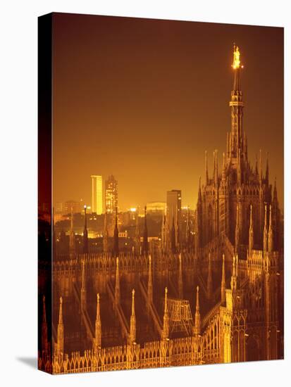The Duomo Topped by an Illuminated Statue of the "Madonnina", Milan, Italy-Ralph Crane-Stretched Canvas