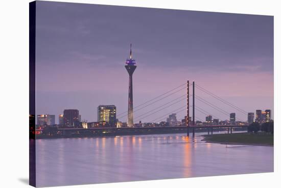 The Dusseldorf Skyline at Dusk, Dusseldorf, North Rhine-Westphalia, Germany, Europe-Julian Elliott-Stretched Canvas