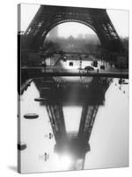 The Eiffel tower reflected, Paris-Michel Setboun-Stretched Canvas