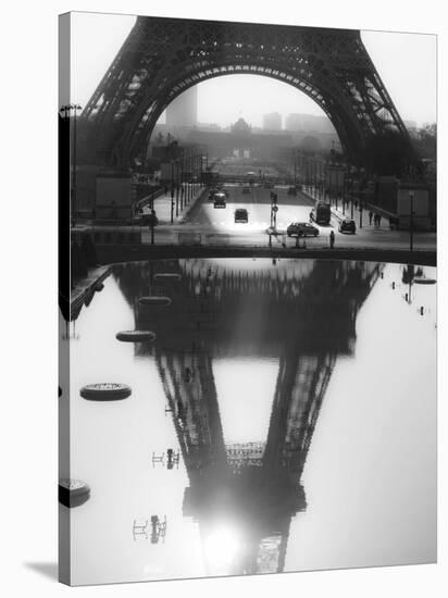 The Eiffel tower reflected, Paris-Michel Setboun-Stretched Canvas