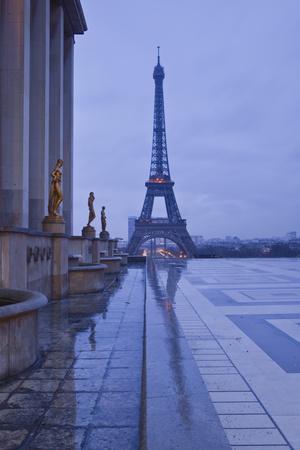 https://imgc.allpostersimages.com/img/posters/the-eiffel-tower-under-rain-clouds-paris-france-europe_u-L-PNPOTT0.jpg?artPerspective=n