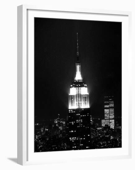 The Empire State Building Lights up at Night-null-Framed Premium Photographic Print