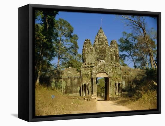 The Entrance Gate to Angkor Thom, Angkor, Siem Reap, Cambodia-Maurice Joseph-Framed Stretched Canvas