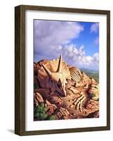 The Exposed Bones of a Triceratops on a Western Landscape-null-Framed Art Print