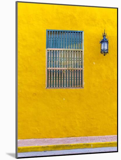 The facade of a colourful traditional building in the old town in Cartagena de Indias, Colombia-Chris Mouyiaris-Mounted Photographic Print