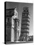 The Famed Leaning Tower of Pisa Standing Beside the Baptistry of the Cathedral-Margaret Bourke-White-Stretched Canvas