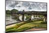 The Famous River Kwai Bridge in Kanchanaburi under a Cloudy Sky in Rainy Season, Thailand-smithore-Mounted Photographic Print