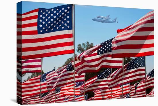 The final flight of the Space Shuttle Columbia flies on 9/21/12 over US Flags at Peperdine Unive...-null-Stretched Canvas