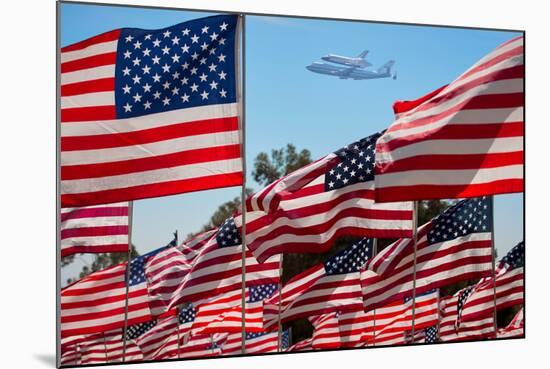 The final flight of the Space Shuttle Columbia flies on 9/21/12 over US Flags at Peperdine Unive...-null-Mounted Photographic Print