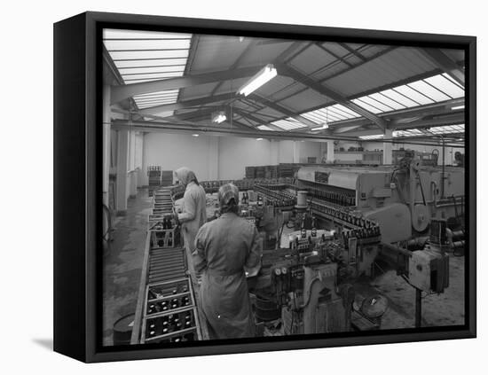 The Final Process of Bottling Beer, Ward and Sons Bottling Plant, Swinton, South Yorkshire, 1960-Michael Walters-Framed Stretched Canvas