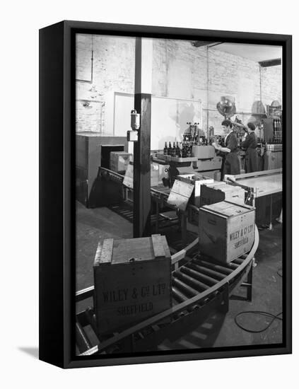 The Final Stages of Bottling Whisky at Wiley and Co, Sheffield, South Yorkshire, 1960-Michael Walters-Framed Stretched Canvas