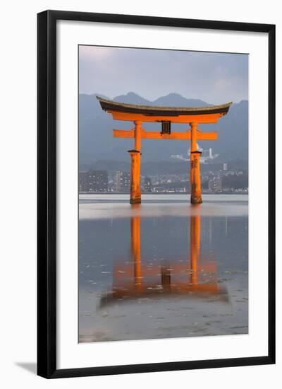 The Floating Miyajima Torii Gate of Itsukushima Shrine at Dusk-Stuart Black-Framed Photographic Print