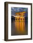 The Floating Miyajima Torii Gate of Itsukushima Shrine at Dusk-Stuart Black-Framed Photographic Print