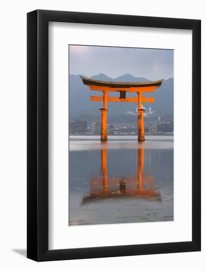 The Floating Miyajima Torii Gate of Itsukushima Shrine at Dusk-Stuart Black-Framed Photographic Print