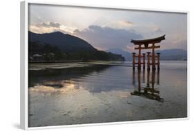 The Floating Miyajima Torii Gate of Itsukushima Shrine at Sunset-Stuart Black-Framed Photographic Print