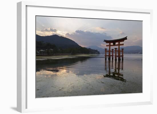 The Floating Miyajima Torii Gate of Itsukushima Shrine at Sunset-Stuart Black-Framed Photographic Print